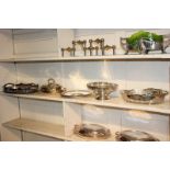 A silver plated oval galleried tea tray, a silver plated entree dish and cover, two cake baskets and