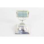 A George V silver inkwell and date desk stand, marks worn, Chester 1920