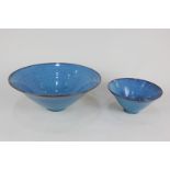 Tessa Fuchs (1936-2012), a studio pottery fruit bowl and a smaller bowl, both decorated with blue