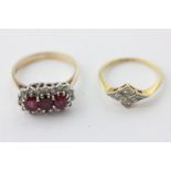 A ruby and diamond ring, claw set with three oval cut rubies within a border of brilliant cut