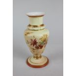 A Royal Worcester porcelain vase, ivory blush with floral design, 14cm high