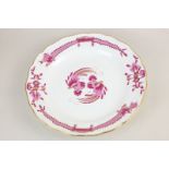 A Meissen porcelain plate in the pink dragons pattern, with gilt embellishment and scalloped