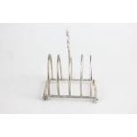 A Victorian silver four-division toast rack, maker James Deakin & Sons, Sheffield 1895