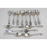 A collection of George III and later teaspoons including a preserve spoon, mustard and cruet spoons,