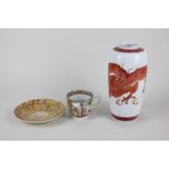 A Chinese Cantonese porcelain teacup, a Satsuma dish, and a Kutani vase depicting a red dragon, 18cm
