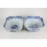 Two Chinese porcelain blue and white square bowls, one depicting figures and dwellings in a lakeside