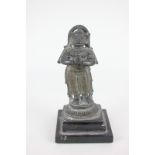 A small metal figure of the Indian deity Hanuman, with wooden base (a/f) 9cm high