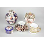 A Royal Crown Derby porcelain pot and cover in Imari pattern, a coffee can and saucer, a Crown