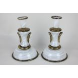 A pair of Venetian glass hand blown candlesticks, the black design with gilt inclusions on white