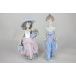 A Lladro Collectors' Society porcelain figure of a girl carrying flowers and watering can, 24cm, and