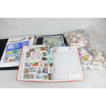 A collection of first day covers, a stamp album and loose stamps, from Great Britain and around