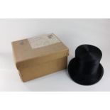A Cuthbertson, London, black brushed silk top hat in original James Lock & Co box