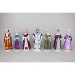 A set of seven porcelain figures of Henry VIII and his six wives, 21cm high