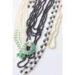 A black pearl long endless necklace, a black and white freshwater pearl necklace, a four-row