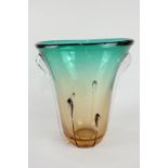 A mid 20th century coloured glass vase with graduated orange to green colour and drip effect