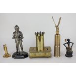 Four various table lighters including a knight and an eagle (a/f), together with a brass money box