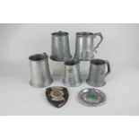 Racing sports car interest, a collection of five pewter trophy tankards, to include four presented