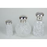 Two Elizabeth II silver mounted cut glass scent bottles with stoppers, makers Carrs of Sheffield
