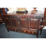 An 18th century oak mule chest, now converted, with two panelled doors, with carved dated MM 1748,