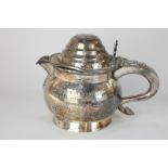 A Chinese white metal teapot with domed lid and scroll handle, engraved armorial and presentation