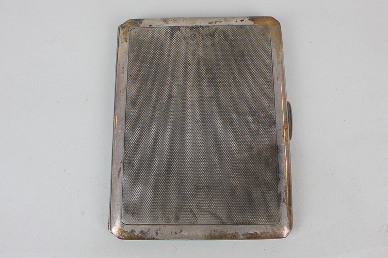 A George VI silver cigarette case, rectangular shape with engine turned decoration, makers Smith &