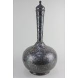 A Damascene metal flask and cover, possibly Indian, of globular form with long tapered neck,