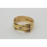An 18ct gold and diamond buckle ring, 3.7g