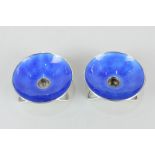 A pair of Danish silver and blue enamel candle holders, maker Anton Michelsen, Copenhagen, with leaf
