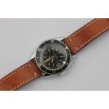 An Eternamatic Kontiki Super steel wristwatch, black dial and rotating bezel, screw down crown,