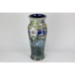 A large Royal Doulton Lambeth baluster vase by Ethel Beard, with tube lined floral decoration on