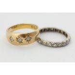 An eight cut diamond full hoop eternity ring, and a gypsy set diamond three stone ring on 18ct gold