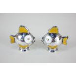 A pair of Danish silver and enamel peppers in the form of goldfish with yellow tails and fins and