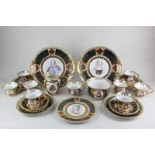 A 19th century Vienna porcelain part tea service, each piece with a portrait of French nobility,