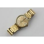 A gentleman's rolled gold Longines automatic watch on gilt expanding bracelet
