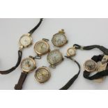 A lady's 9ct Vertex watch, and seven others similar