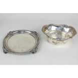 A George V silver circular waiter with gadroon border on four shell cast feet, maker Fenton