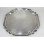 A George V silver salver, maker Walker & Hall, Sheffield 1930, presented to Mr J C Buscarlet by