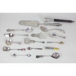 A German 835 silver spoon with rose finial, and an American silver spoon, together with a collection