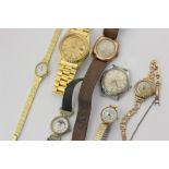Two 9ct gold watches, and five others
