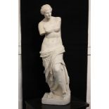 A white plaster figure of the Venus de Milo, 82cm high