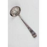 A George III silver sifter spoon with engraved handle and armorial, pierced foliate bowl, marks