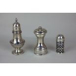 A George VI silver pepper mill, maker John Grinsell & Sons, 1938, together with two Victorian silver