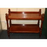 A Victorian mahogany two-tier buffet, on turned supports and castors, 89cm