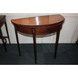 A George III inlaid mahogany demi-lune tea table with folding top on square tapered legs, 92cm, (a/