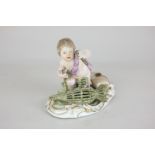 A Meissen style porcelain figure of a semi nude child holding a fish caught in a trap, starred