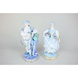 A pair of German porcelain figures of a gardener and a flower seller, the man holding a rose with