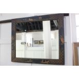 A Chinoiserie decorated black lacquered wall mirror, 58cm by 68cm