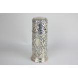A Victorian silver sugar caster, cylindrical shape with embossed scroll and floral decoration,
