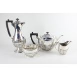 An Edward VII silver four piece tea set, maker Goldsmiths & Silversmiths Co Ltd, London 1908,