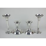 A pair of George V silver dwarf candlesticks, maker J C Ltd, Birmingham, 1922, together with a